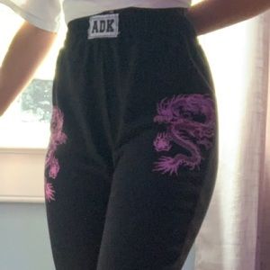 ADIKA snake sweats. With purple snakes